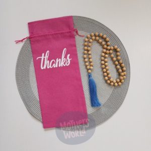 Pink thanks wine bottle bag with tassel necklace
